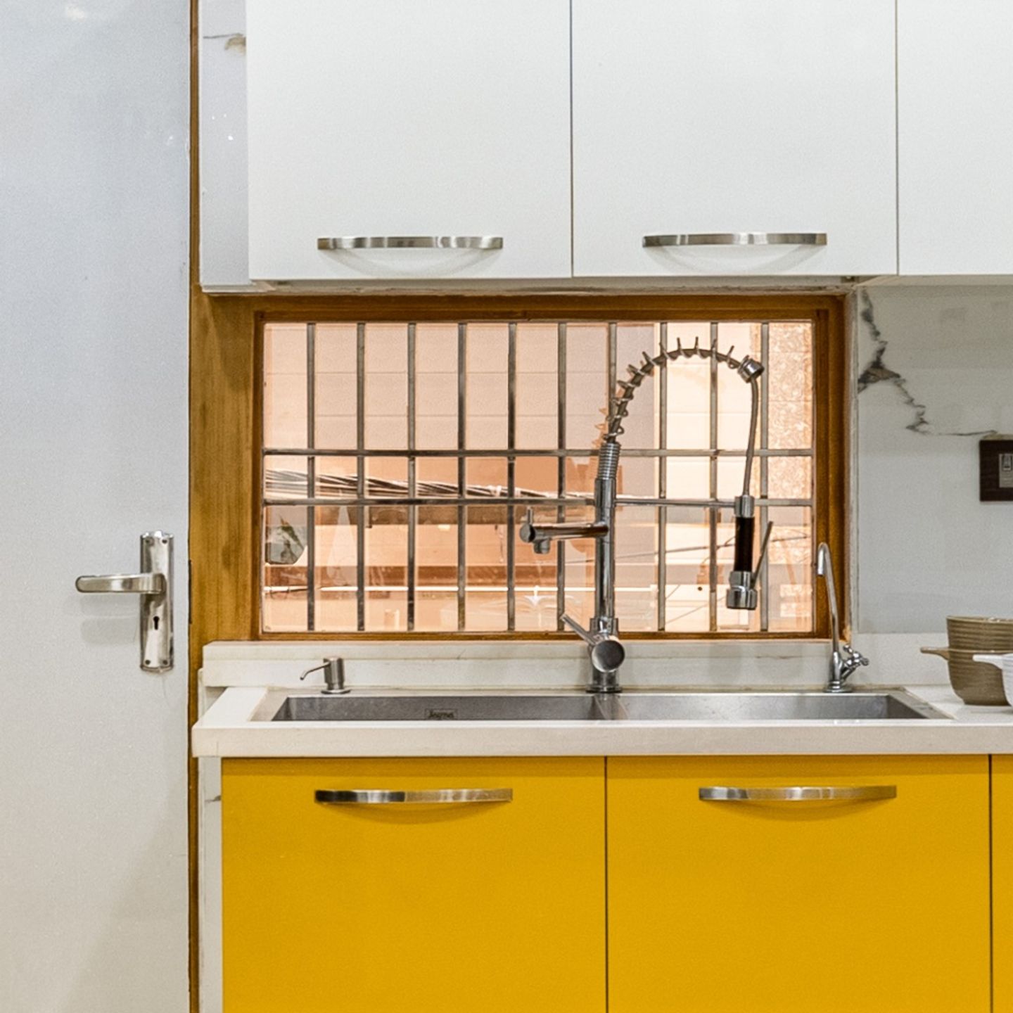 Compact Kitchen Window Grill Design - Livspace