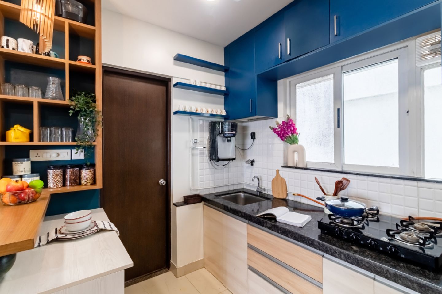 Kitchen Window Design With An Exhaust Fan Opening Livspace