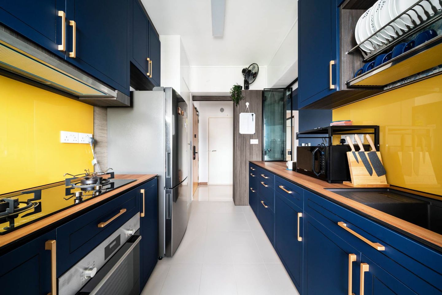 Blue And Yellow Contemporary Kitchen Interior - Livspace
