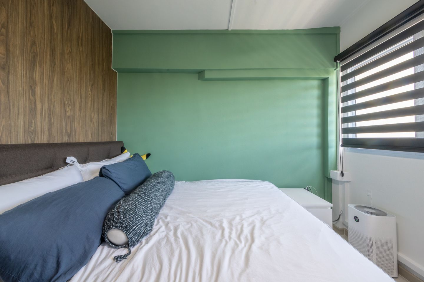 Minimalist Interior Design With Sea Green Wall And Cosy Double Bed