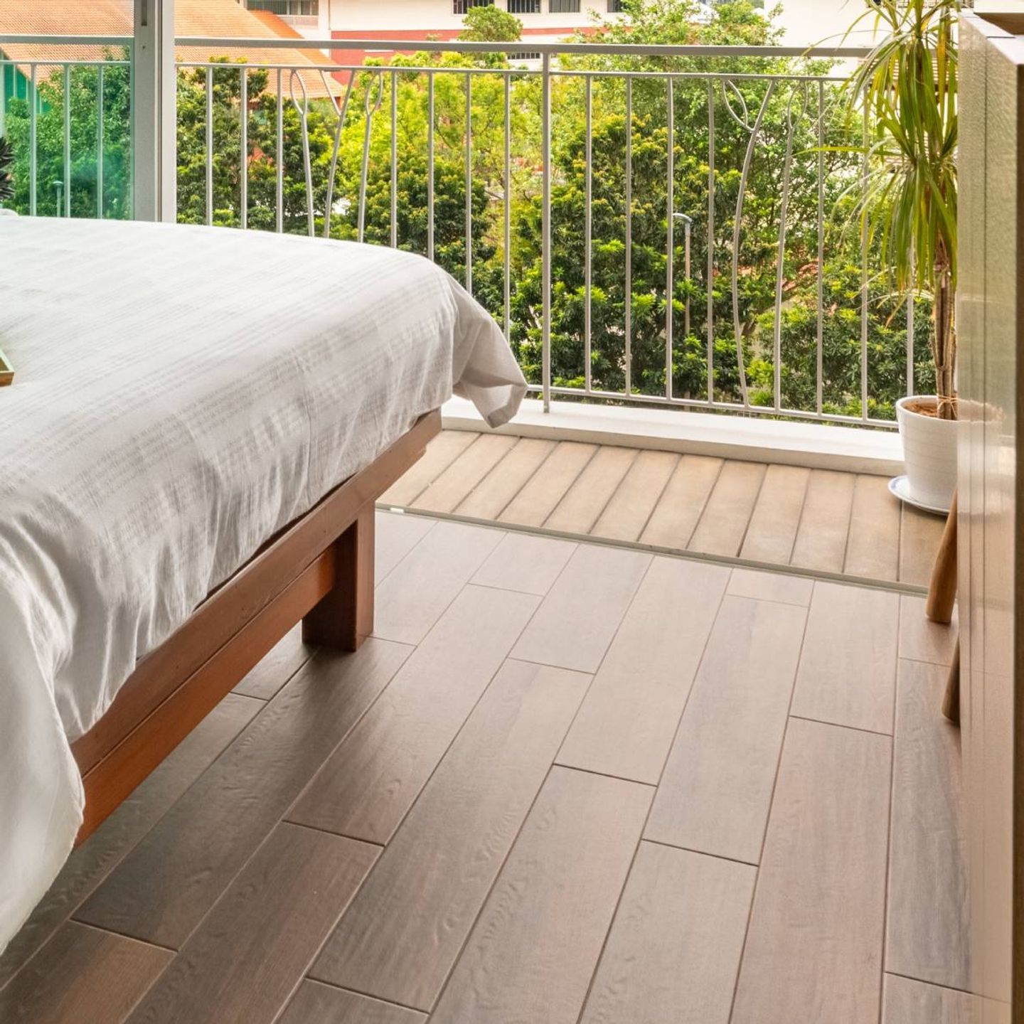 Brown Wooden Flooring Design For Bedrooms - Livspace