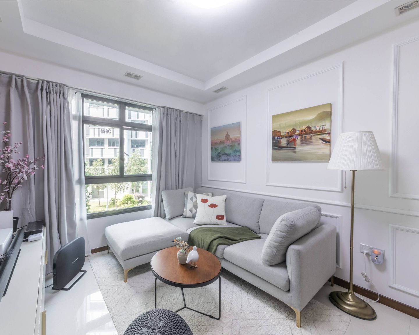 Minimalist Living Room With Grey Sofa - Livspace