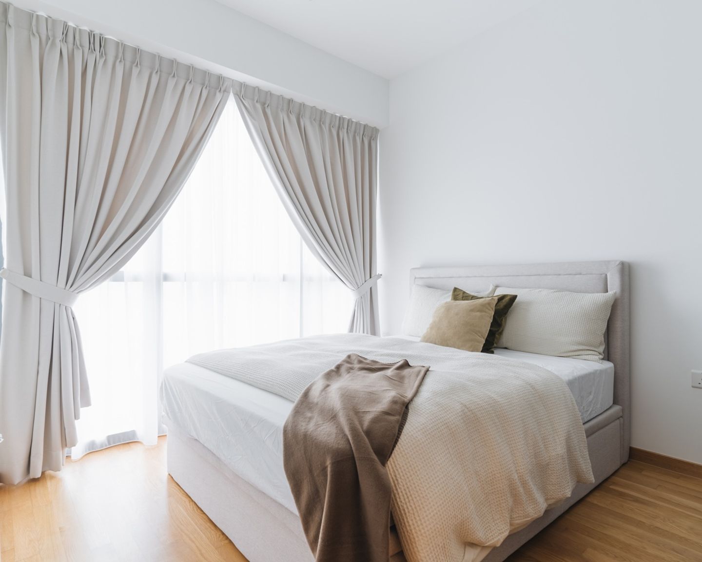 White Bedroom Design With Wooden Flooring - Livspace