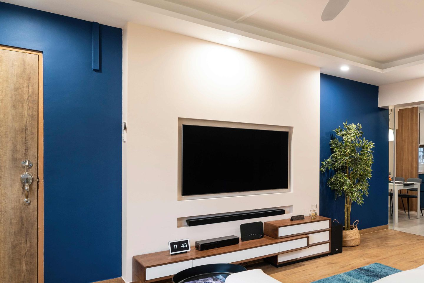 Modern White And Blue Wall Design With Textured Wall And TV Panelling