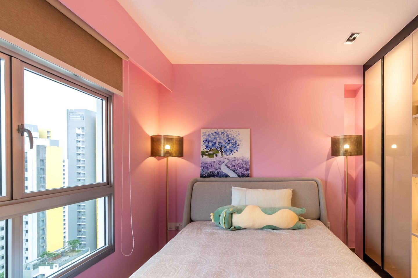 Modern Painted Pink Wall Design With Brass Lamps