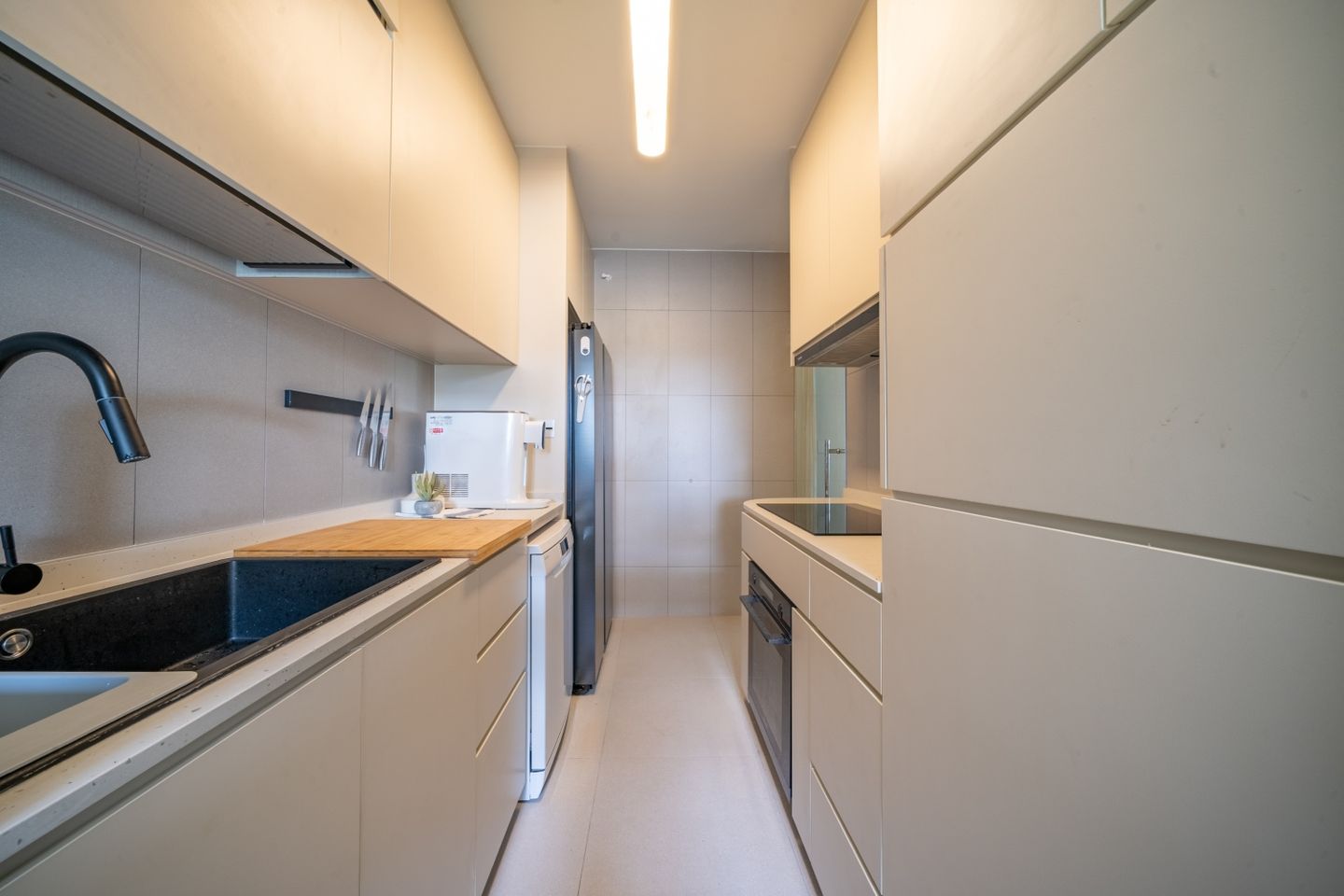 Parallel Kitchen Design With Closed Storage - Livspace