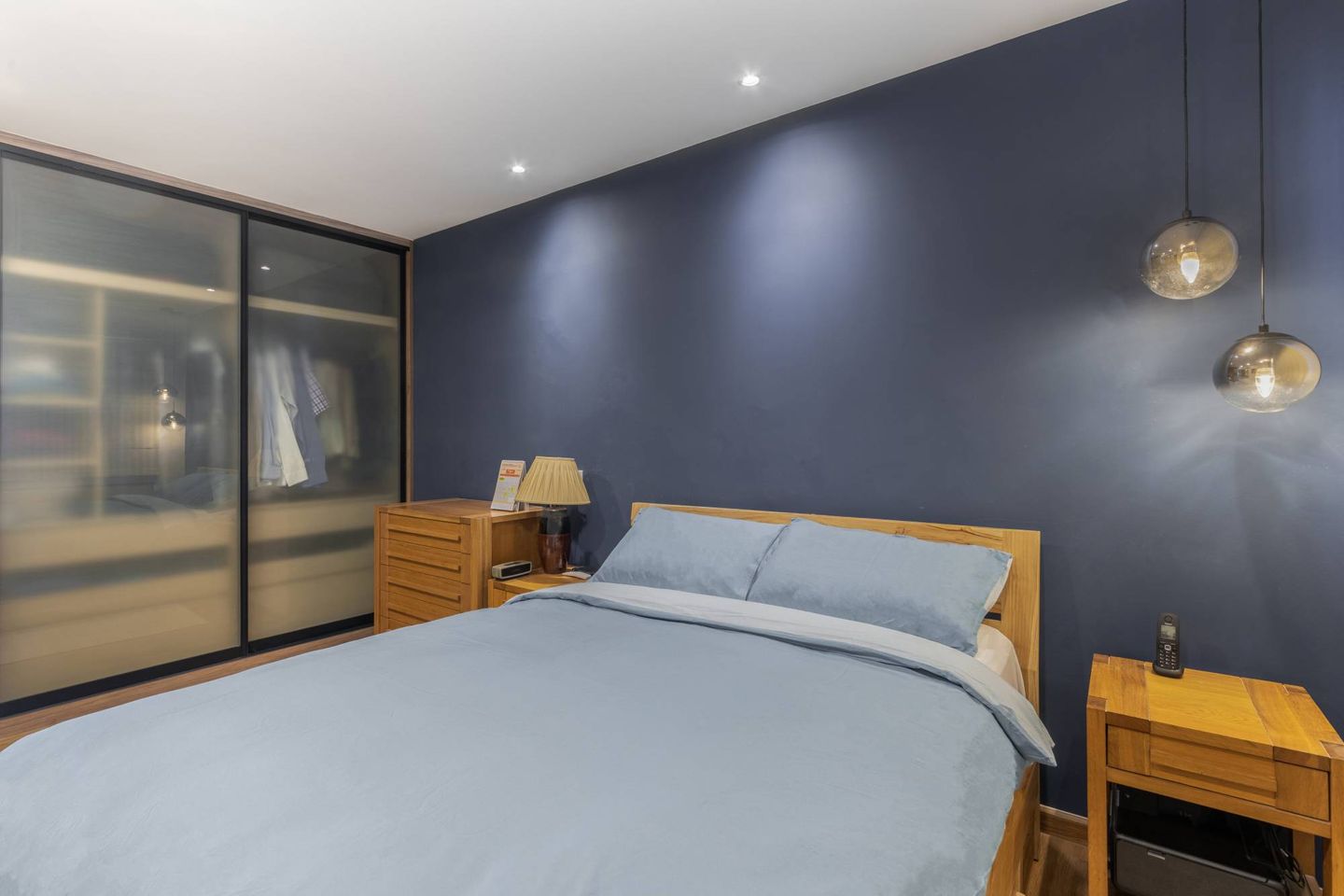 Modern Bedroom Design With Sliding Wardrobe And Chest Of Drawers