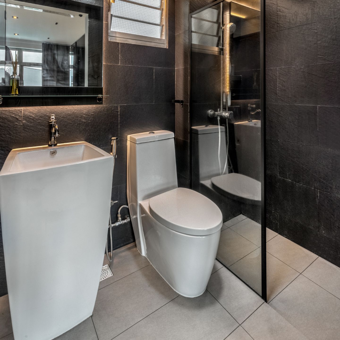 Dual-Toned Bathroom Design With Warm Lighting - Livspace
