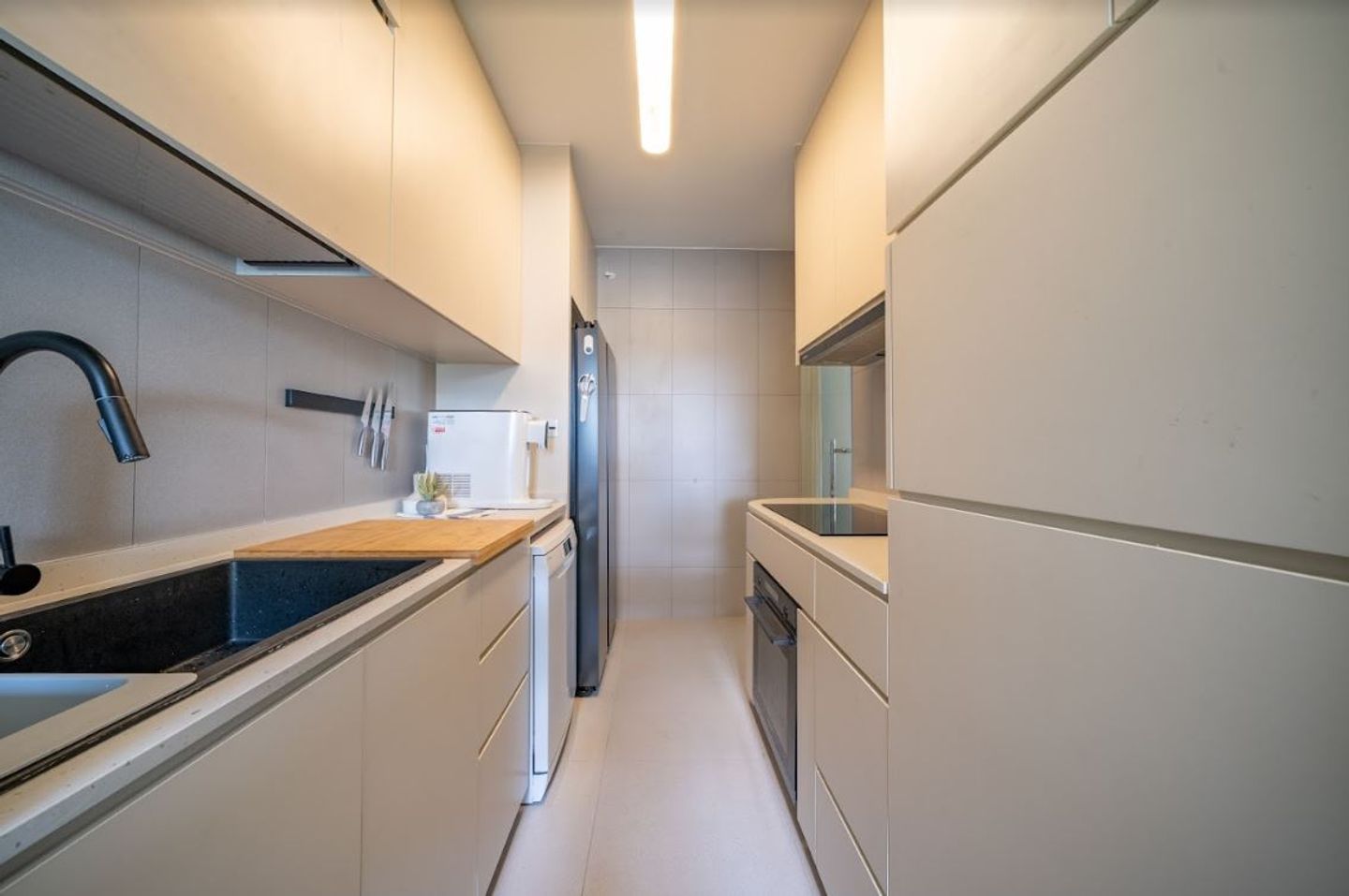 Minimal Compact Kitchen Cabinet Design In Beige