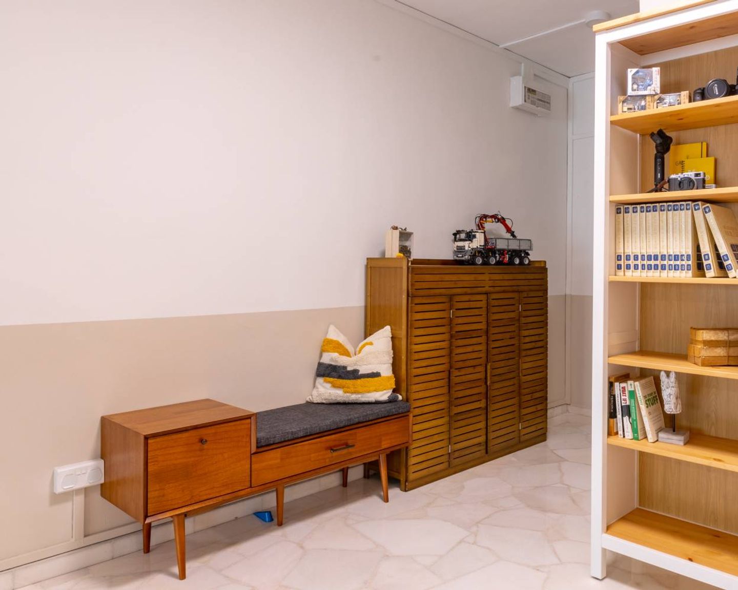 Foyer Design With Wooden Storage Unit And Seater Livspace