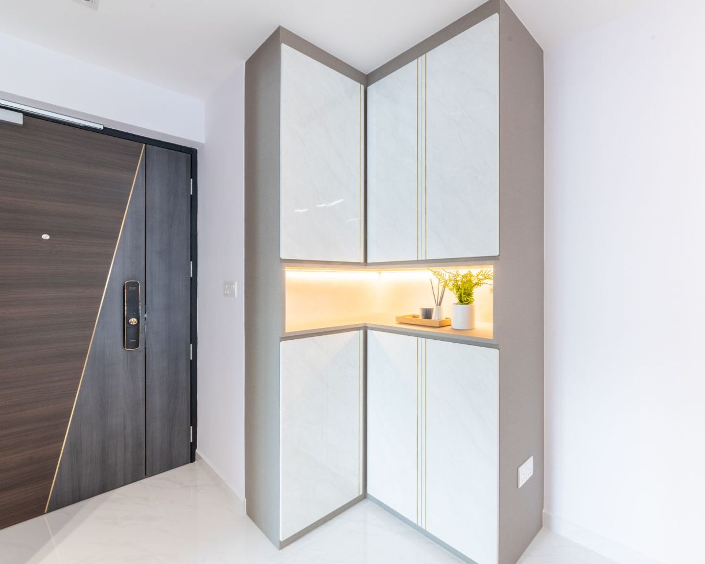 Spacious Foyer Design With LShaped Storage Unit Livspace