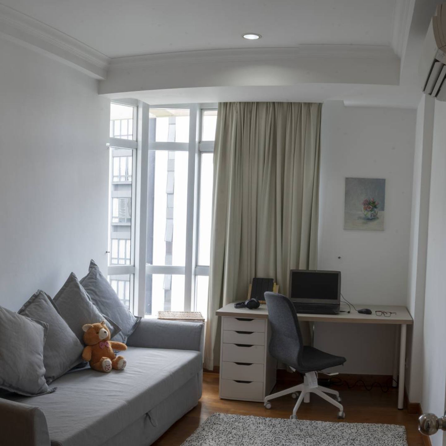 Wood And White Home Office Design With Grey Sofa | Livspace