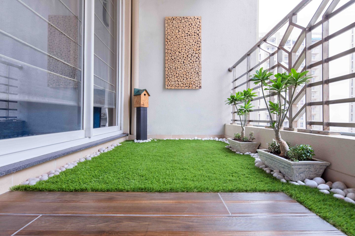 5X9 Ft Balcony Design With Turf Grass And Mural- Livspace