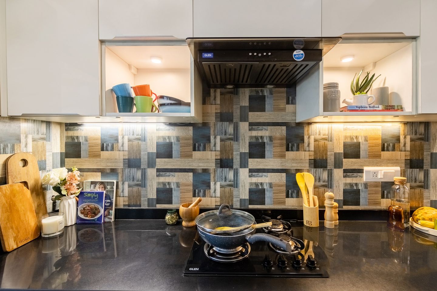 1. Abstract Multicoloured Rectangular Kitchen Tile Design - Livspace 2. Ceramic Multicoloured Kitchen Tile Design For Backsplash In A Parallel Kitchen Design - Livspace
