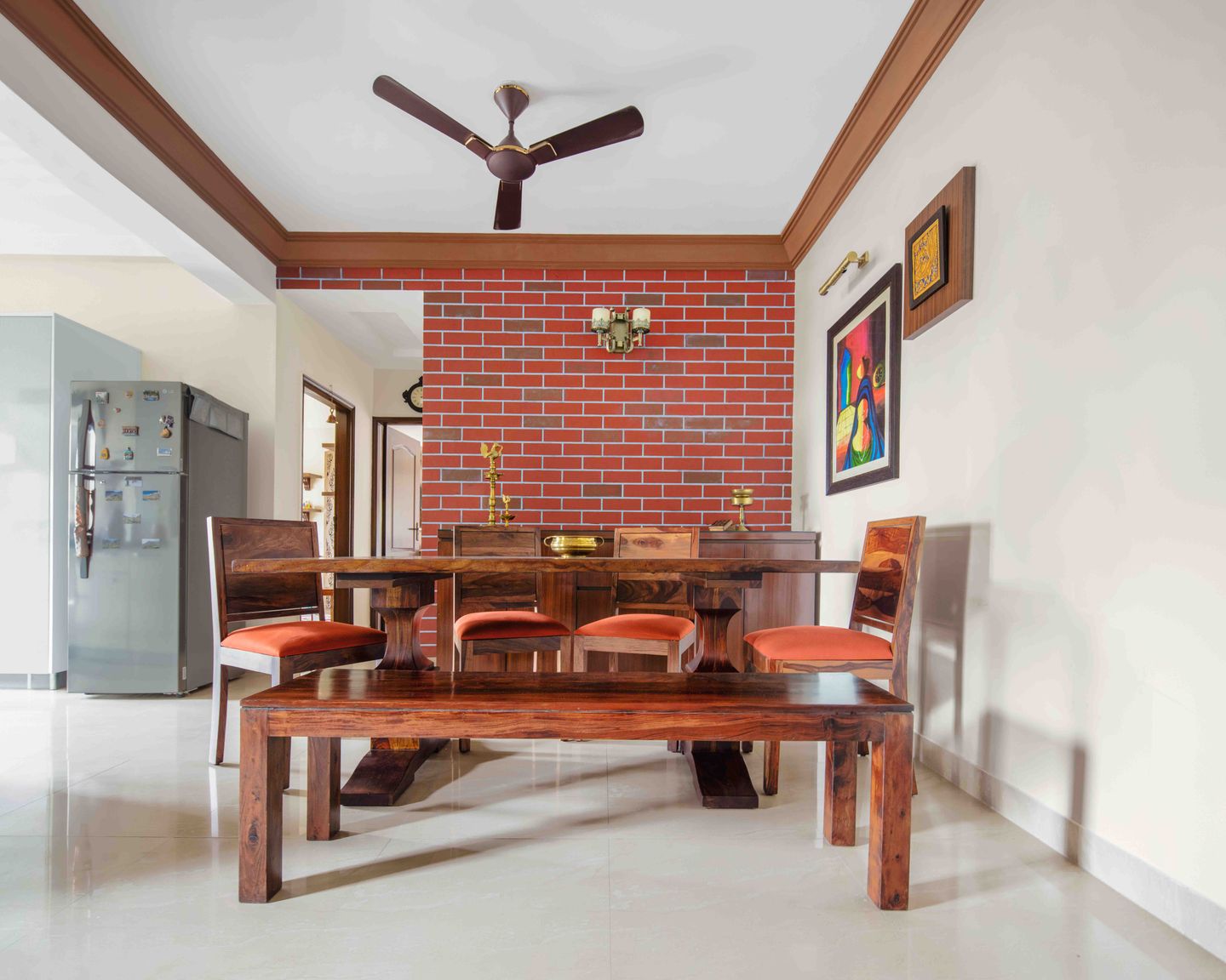 6-Seater Dining Hall With Wooden Furnitures And Framed Wall Art | Livspace