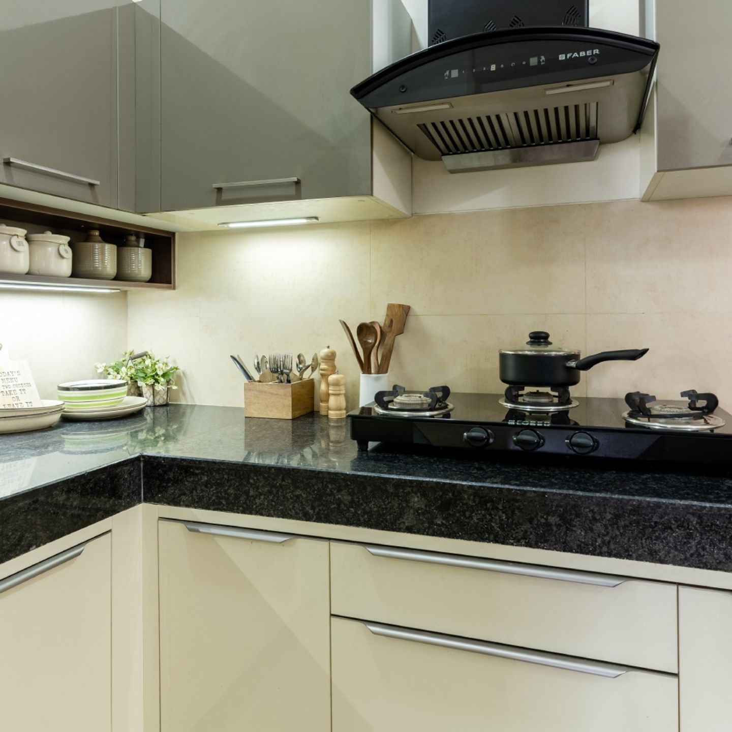 Modern L-Shaped Modular Kitchen Design With Light Beige Dado Tiles