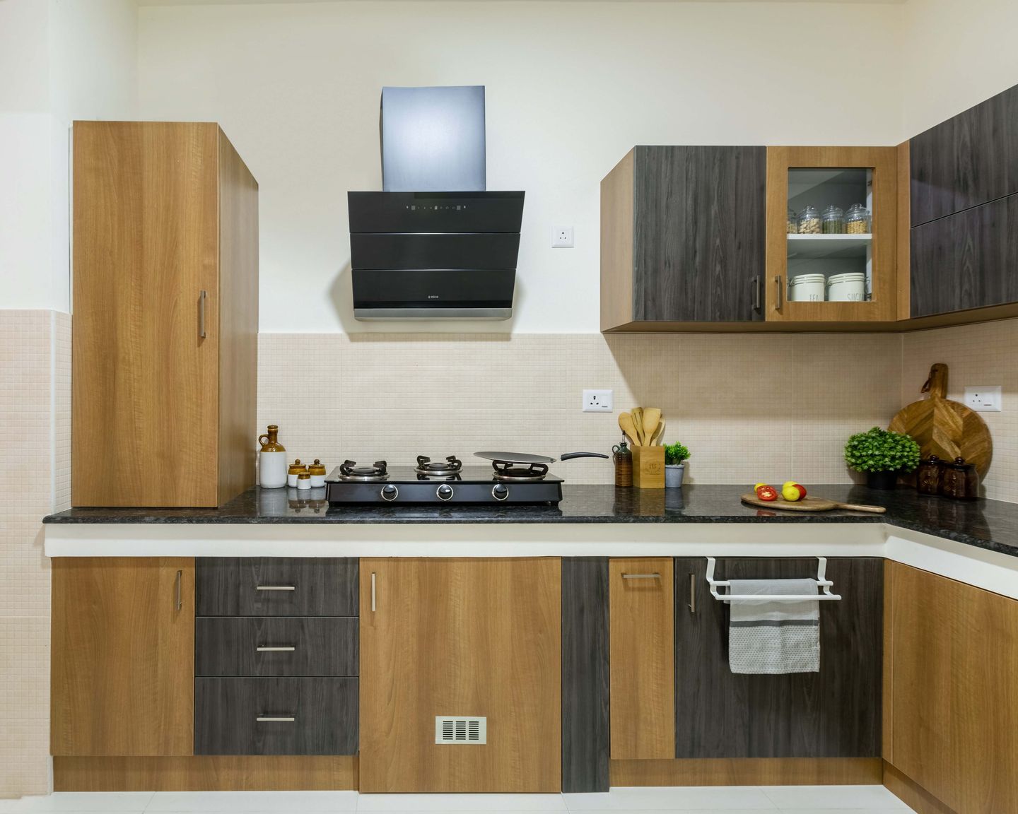 8x6 Ft L-Shaped Modular Kitchen Design In Brown And Grey - Livspace 8x6 Ft L-Shaped Kitchen Design With Off-White Dado Tiles - Livspace