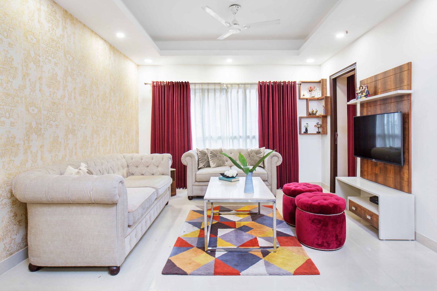 Beige And Red Living Room Design With TV Unit 9x9 Ft Livspace