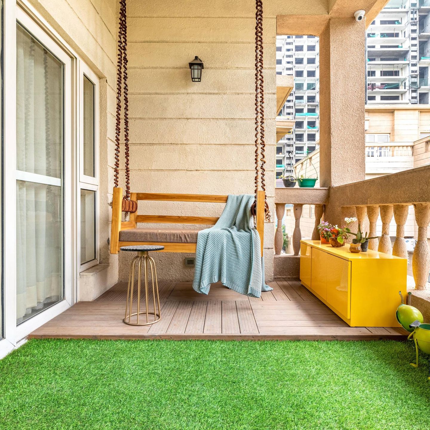 Home Balcony Design With A Hanging Swing | Livspace