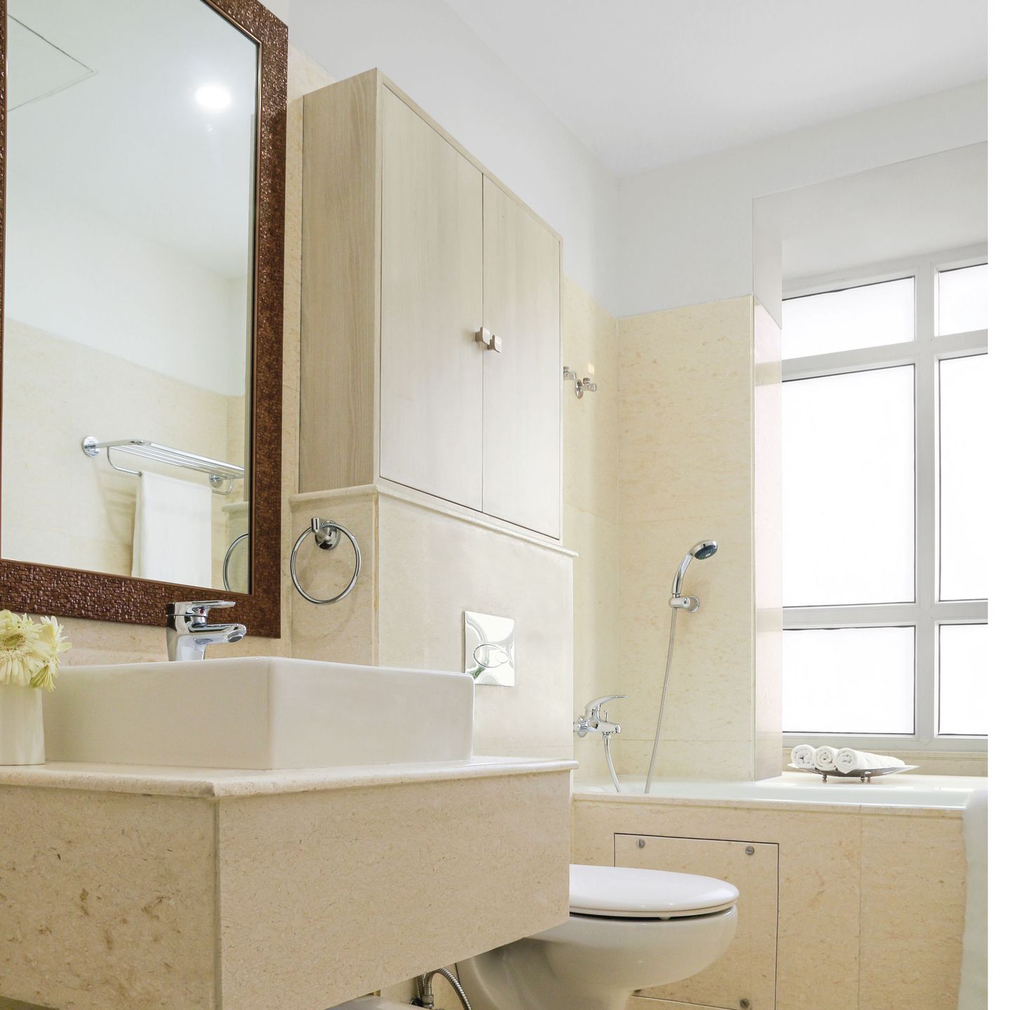 Cream-Coloured Bathroom Design With Ceiling Lights | Livspace