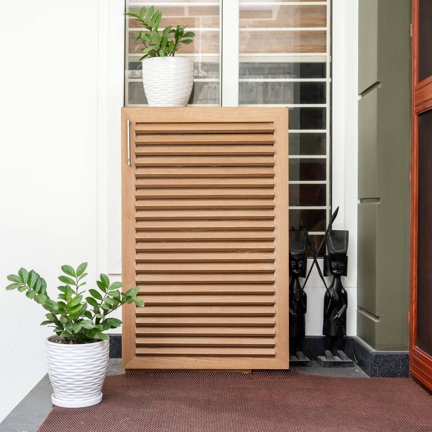 Foyer Design With Brown Storage Unit - Livspace