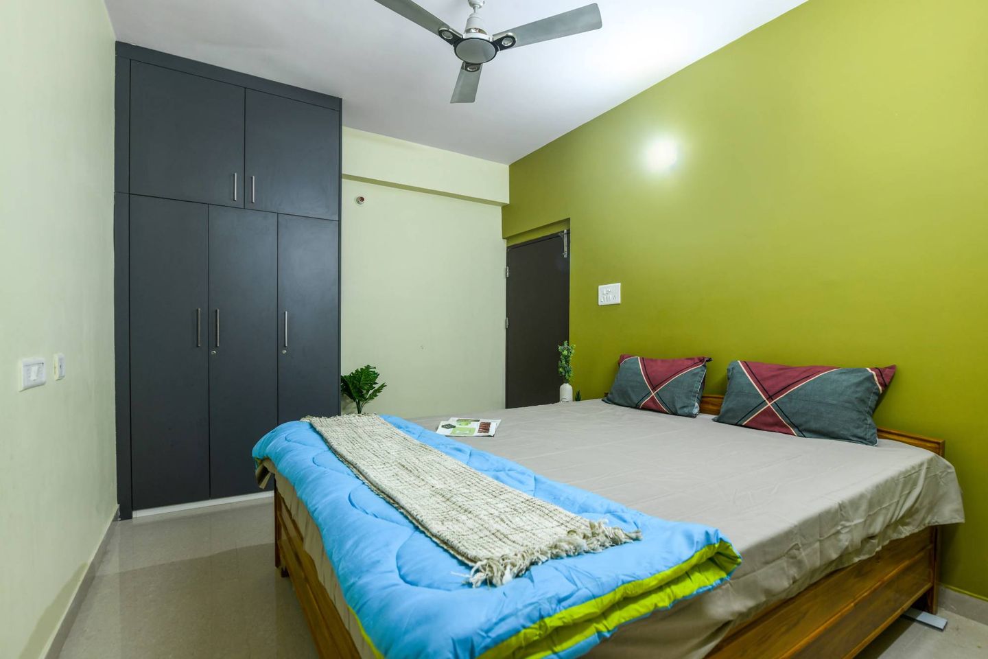 Modern Guest Room Design With Lime Green Accent Wall