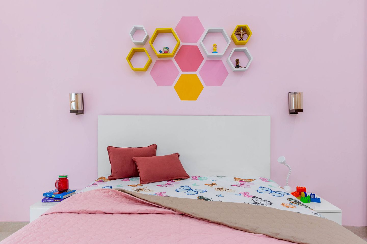 Shabby Chic White And Pink Kid's Room Design With Hexagonal Shelves