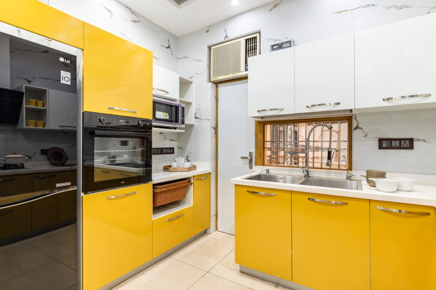 Modern U-Shaped Kitchen Design With Yellow And White Cabinets