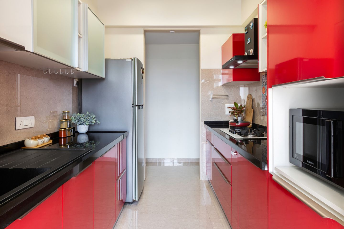 Modern Parallel Kitchen Design With Colourful Backsplash Tiles