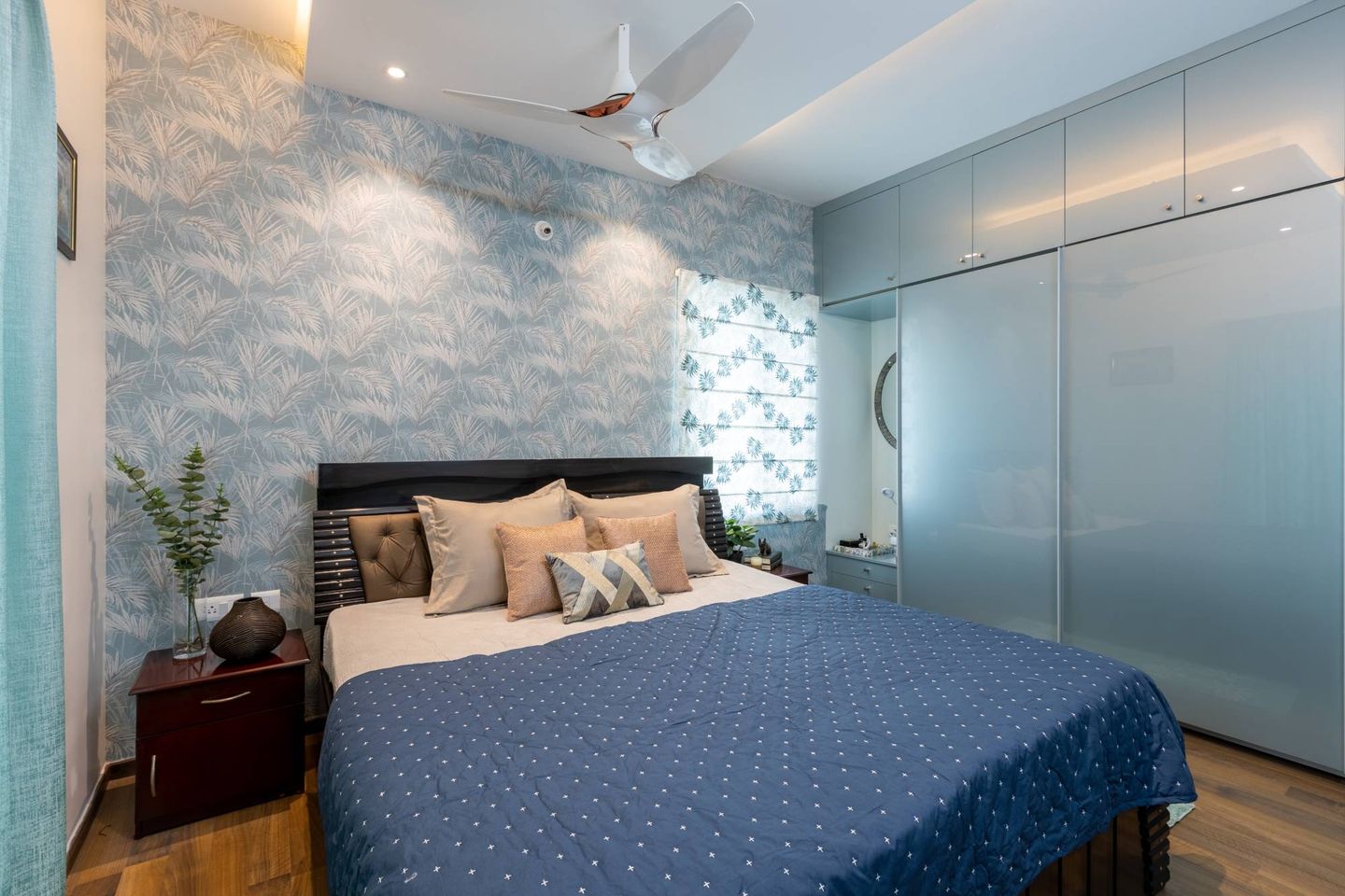 Contemporary Bedroom Design With A King Size Bed And Wooden Side Tables