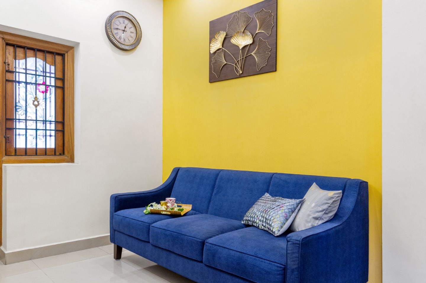 Yellow Wall Paint Design For Living Rooms Livspace