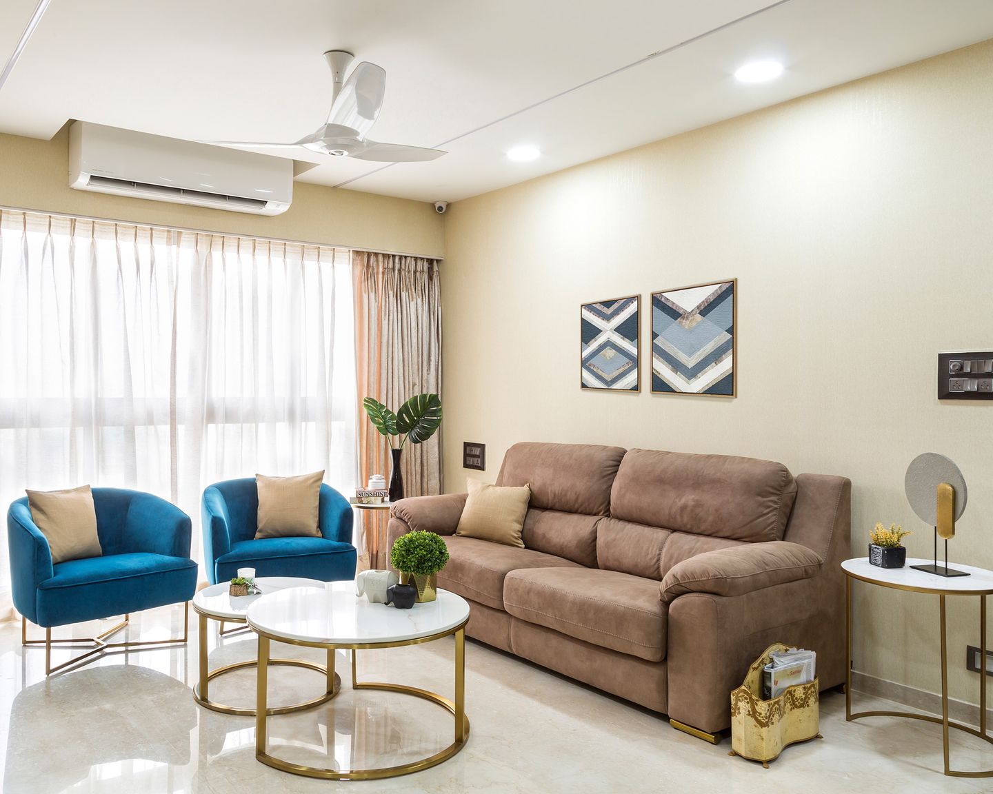 Spacious Living Room Design With Brown And Blue Sofa Set And White