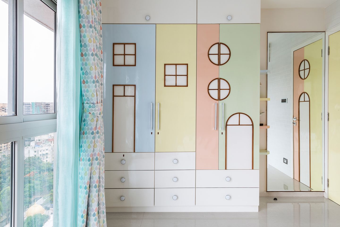 Multicoloured Modern 4-Door Swing Wardrobe Design With Geometric Shapes - Livspace