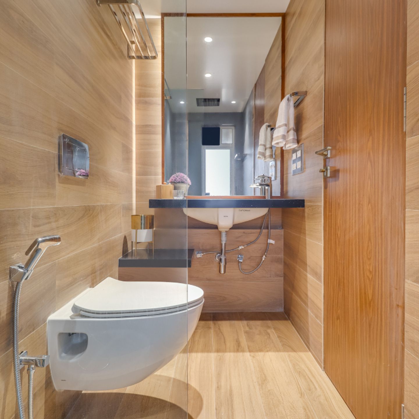 7X6 Ft Wooden Small Bathroom Design - Livspace