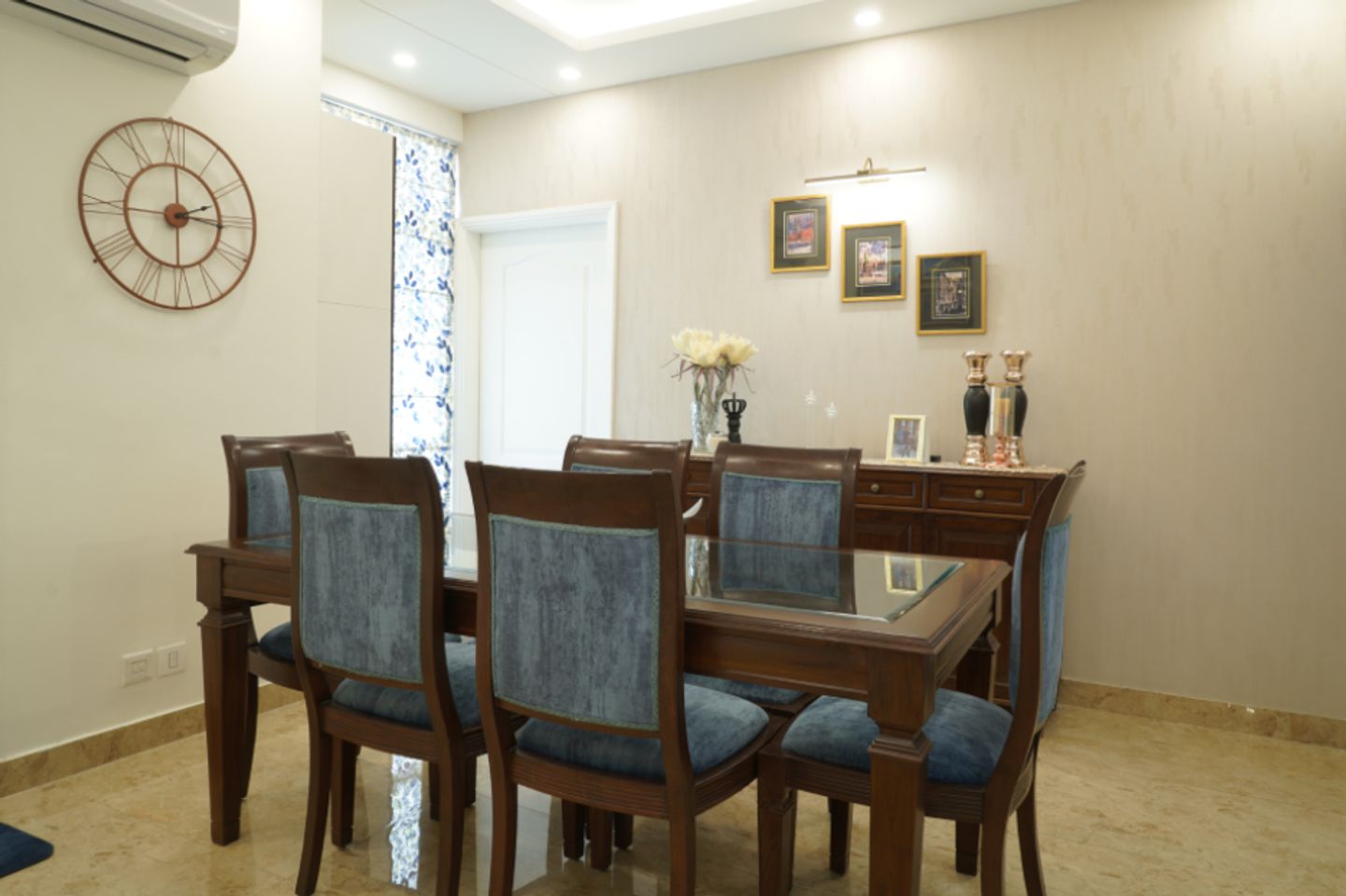 Modern Dining Room Design With Blue Upholstered Wooden Chairs