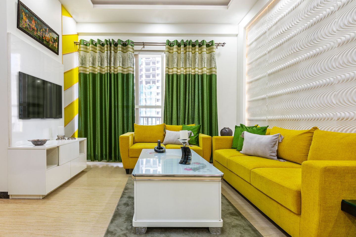 3-BHK Flat In Noida With A Bright Yellow And Green Living Room - Livspace