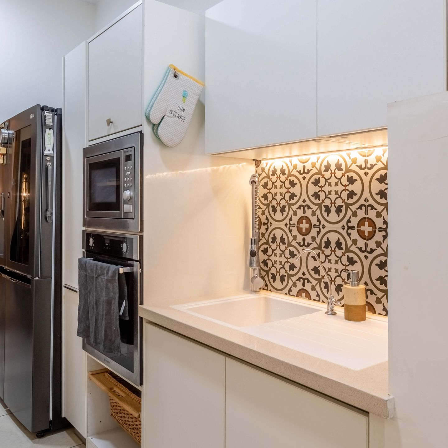 Frosty White Modular Parallel Kitchen Design With Patterned Backsplash - Livspace
