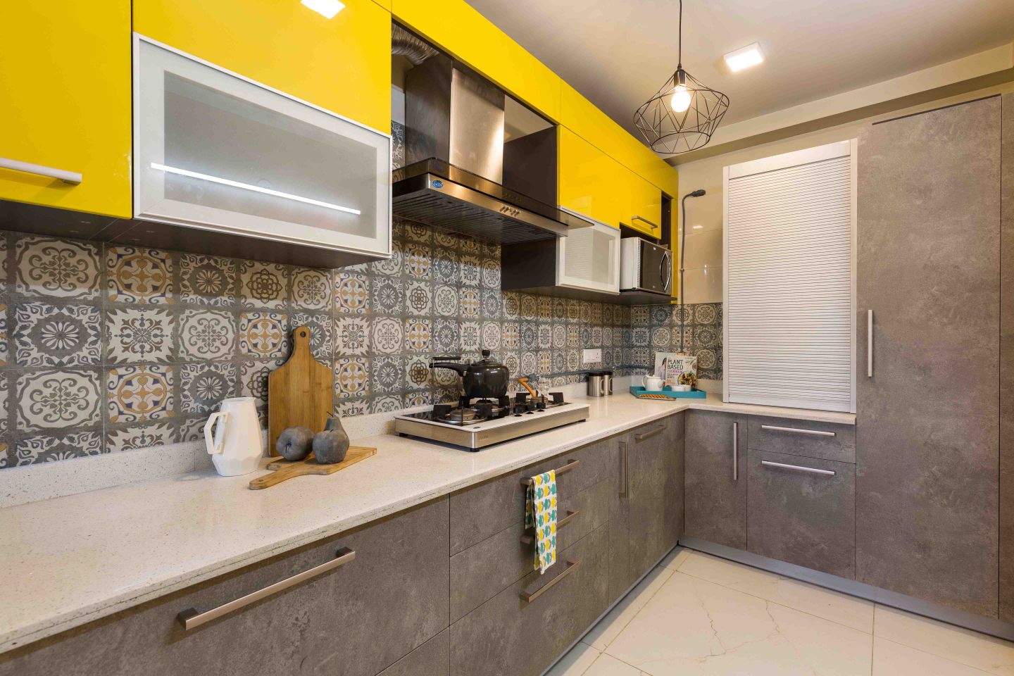 Modular Grey And Yellow Kitchen Design With Moroccan Backsplash - Livspace