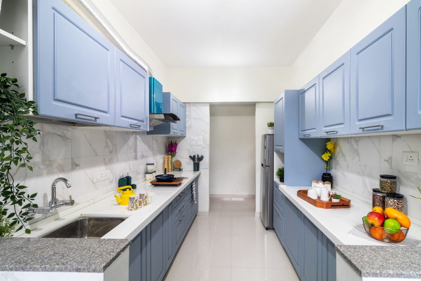 Blue Parallel Kitchen Design With Denim Suedette Cabinets - Livspace