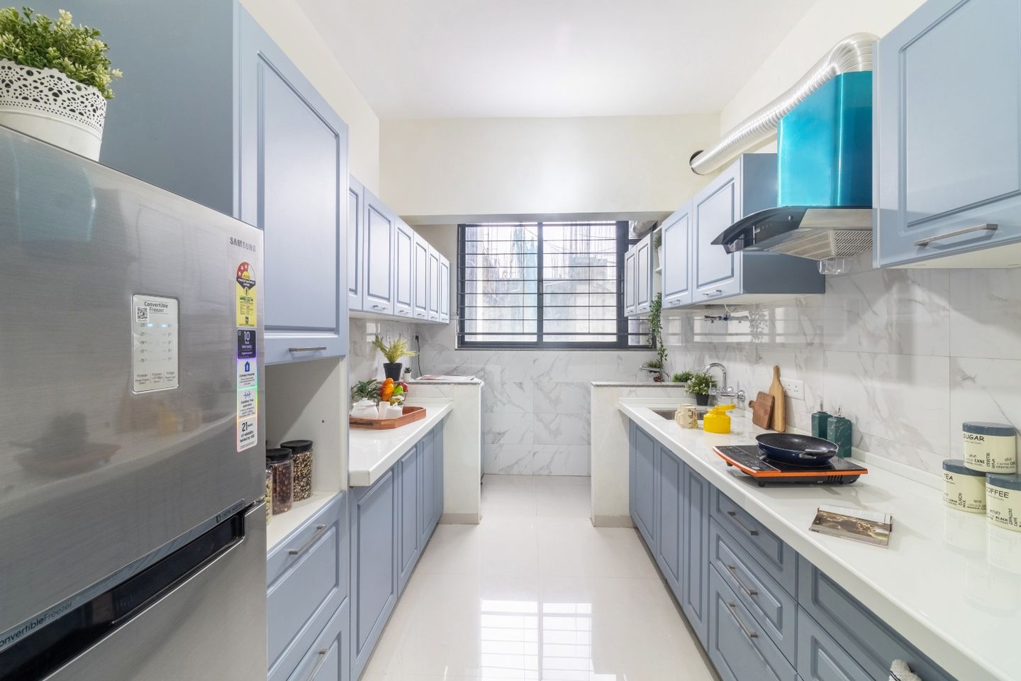 Coastal Blue Parallel Kitchen Design With Denim Suedette Cabinets