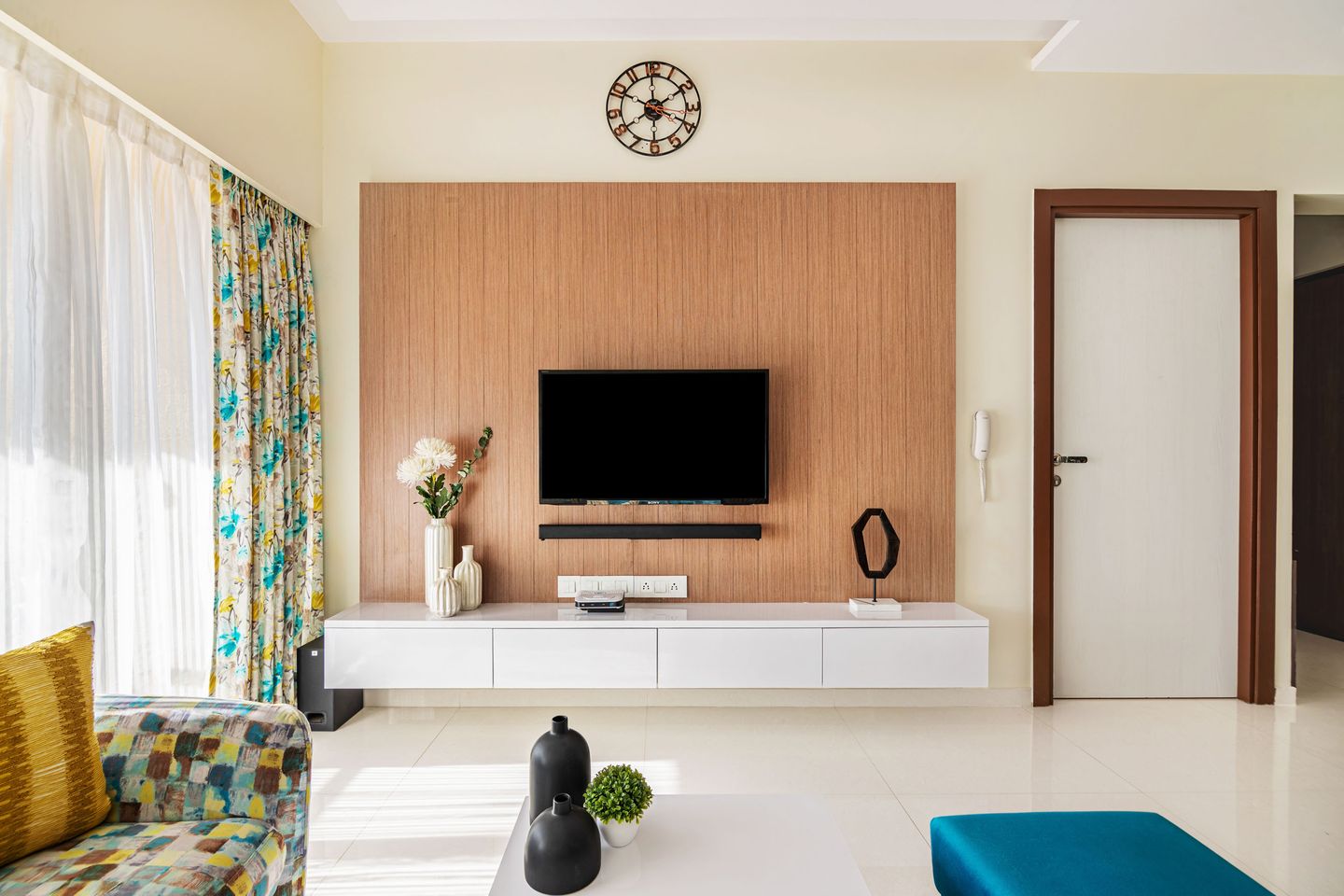 Wall-Mounted White TV Unit Design With Wooden Panelling - Livspace