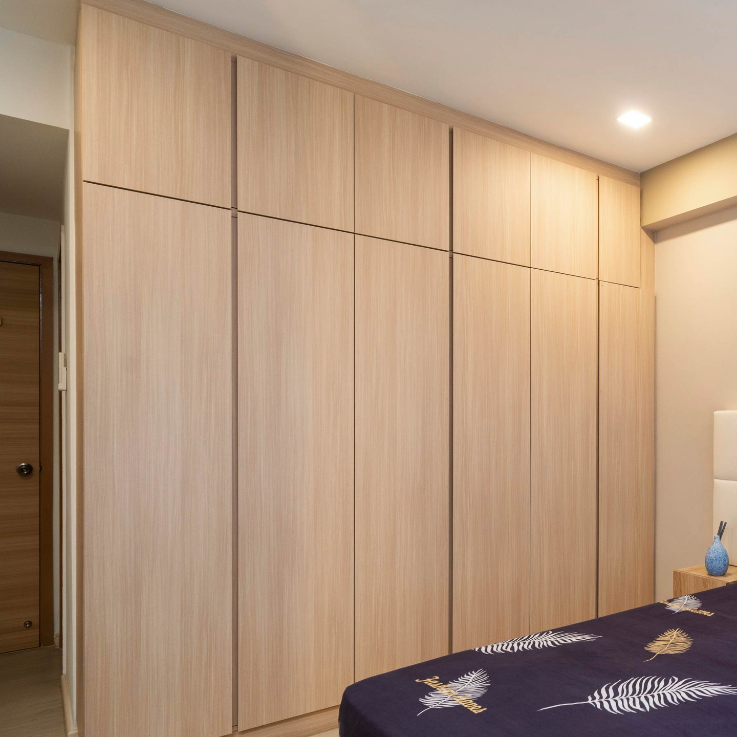 Light Wooden Laminate Design For Wardrobe And Loft - Livspace