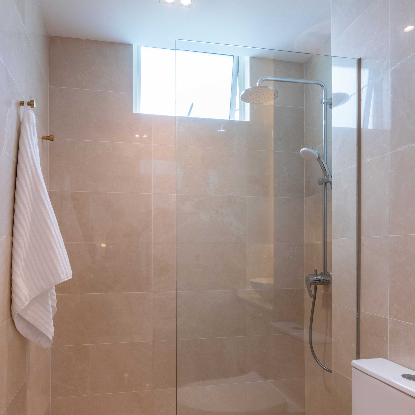 Brown Porcelain Tiles Design For Bathrooms | Livspace