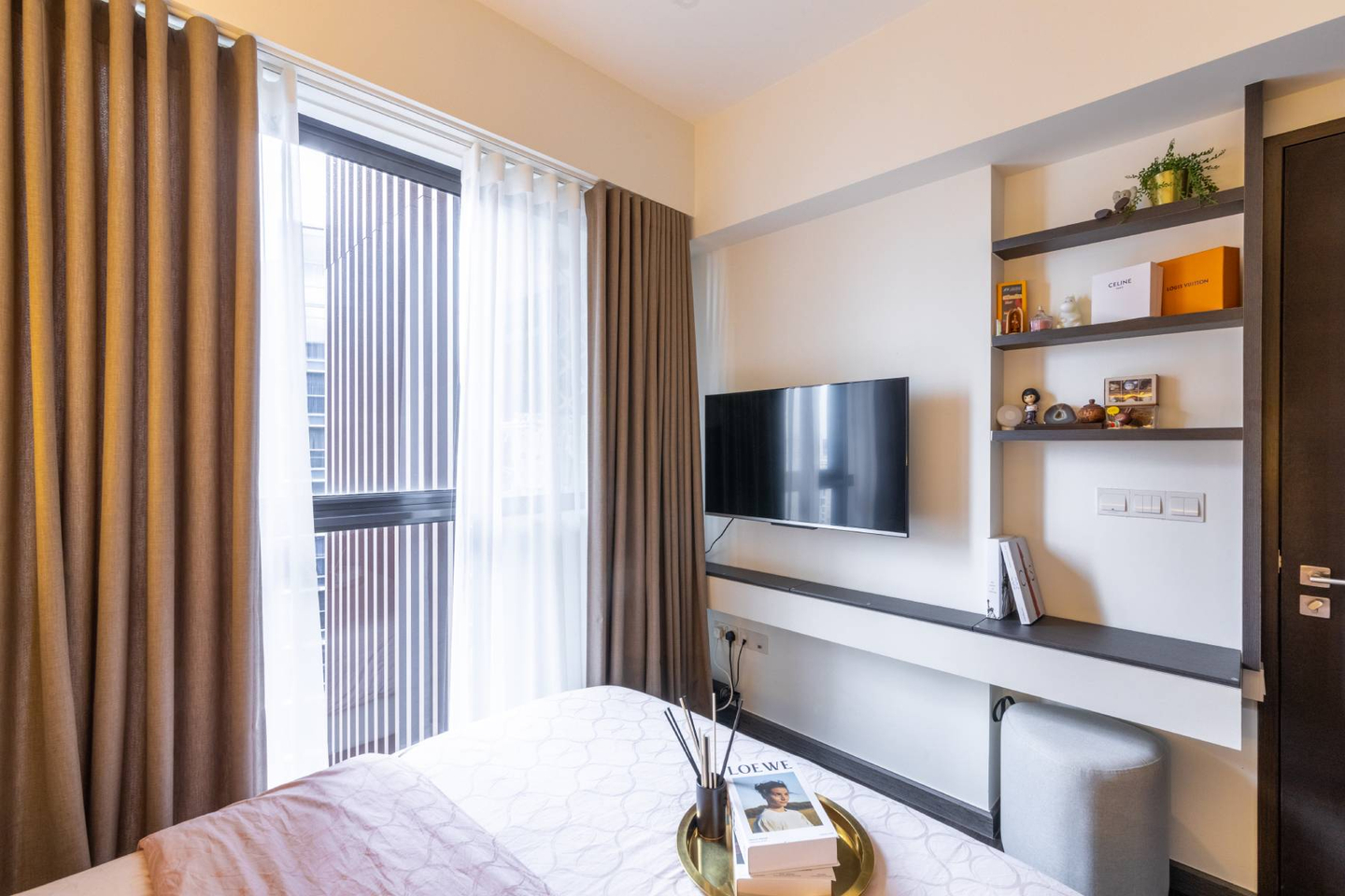 Minimalist TV Unit Design With Open Storage | Livspace