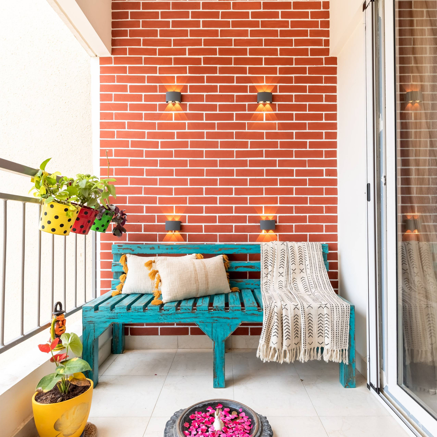 Balcony Design With Brick-Patterned Wall And Wall Lights - Livspace