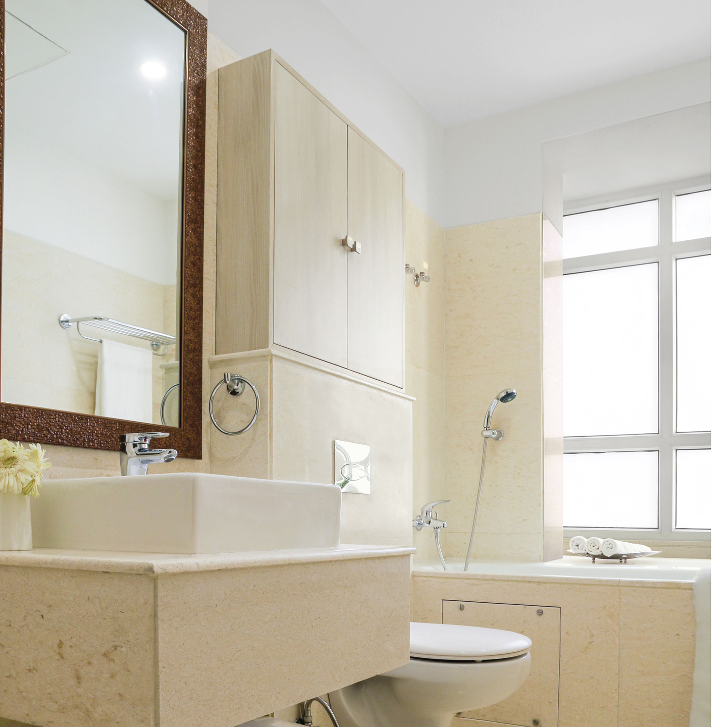 Cream-Coloured Bathroom Design With Ceiling Lights | Livspace