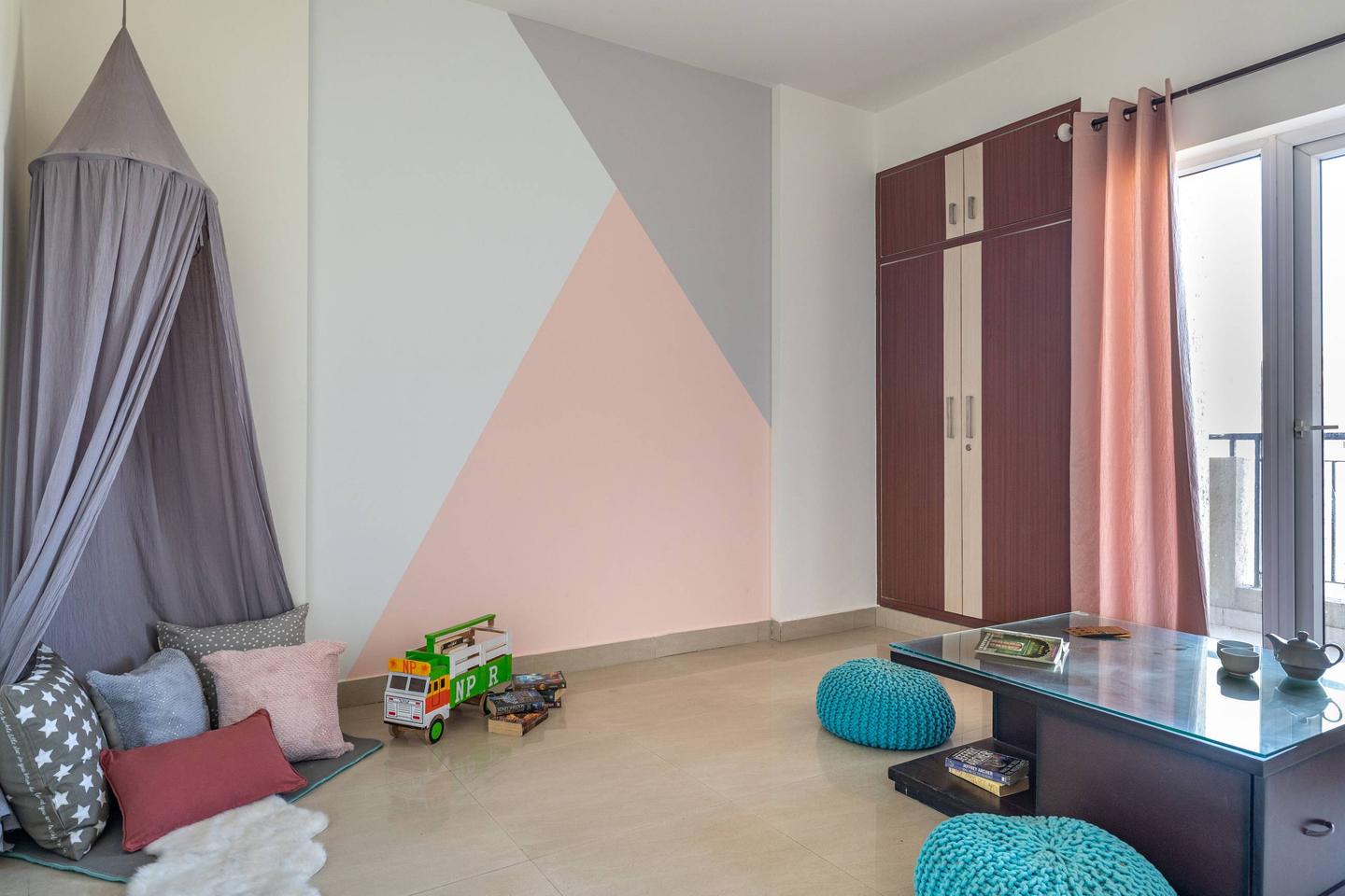 Kids' Room With A Canopy Floor Bed And Light Wooden Finish - Livspace