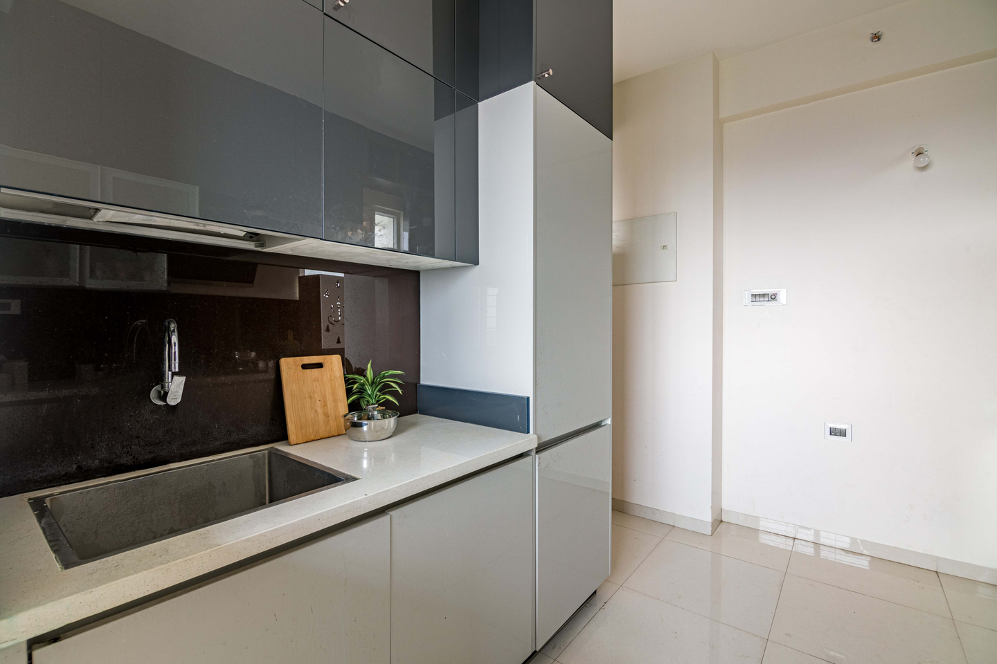 Modern Parallel Kitchen Design With Closed Storage Cabinets