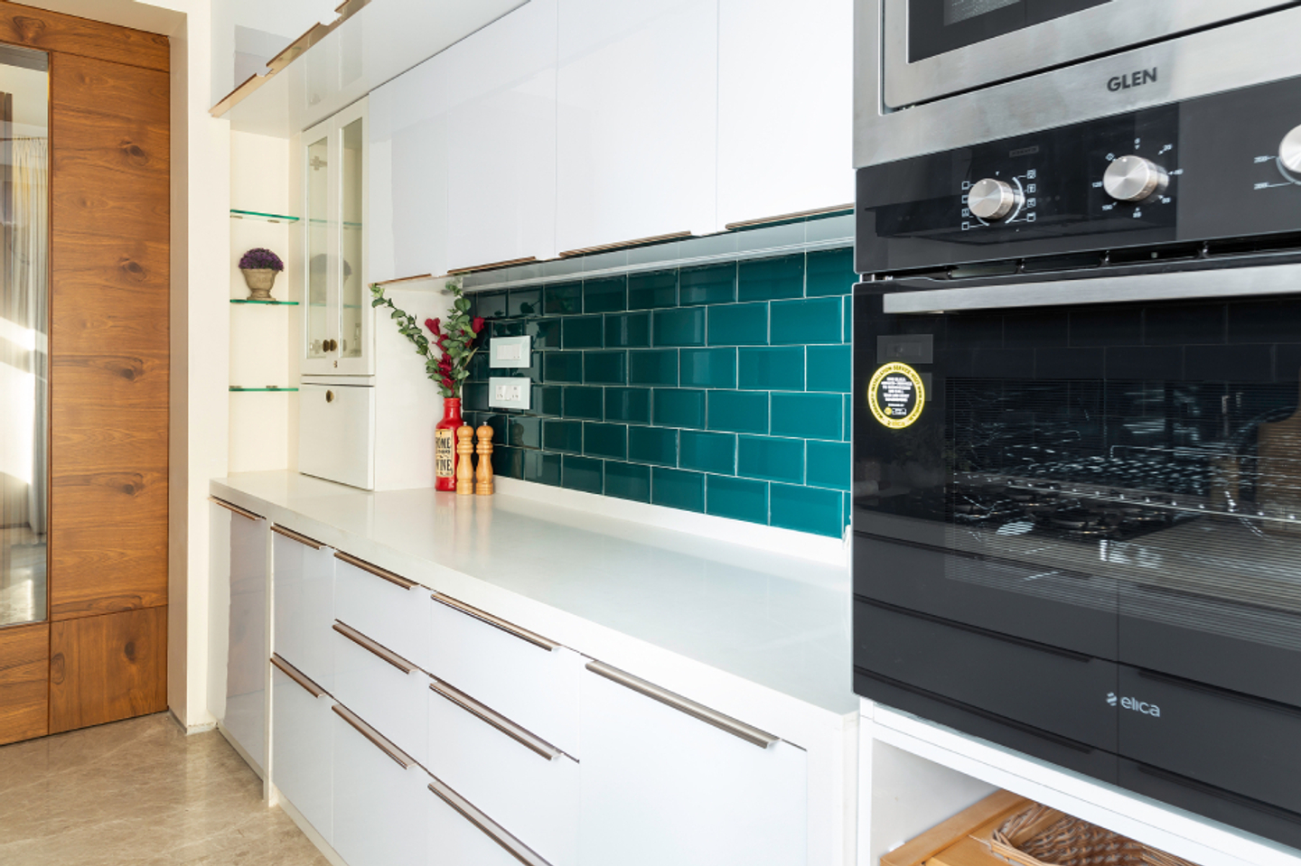 Contemporary Parallel Kitchen Design With Turquoise Subway Tiles