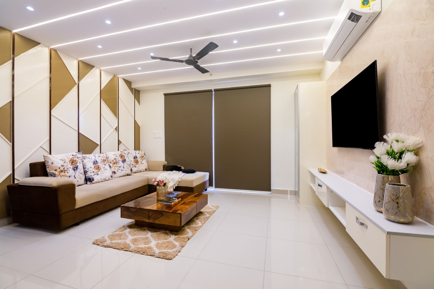 Living Room Decor With A Contemporary False Ceiling Design With Profiled Lights